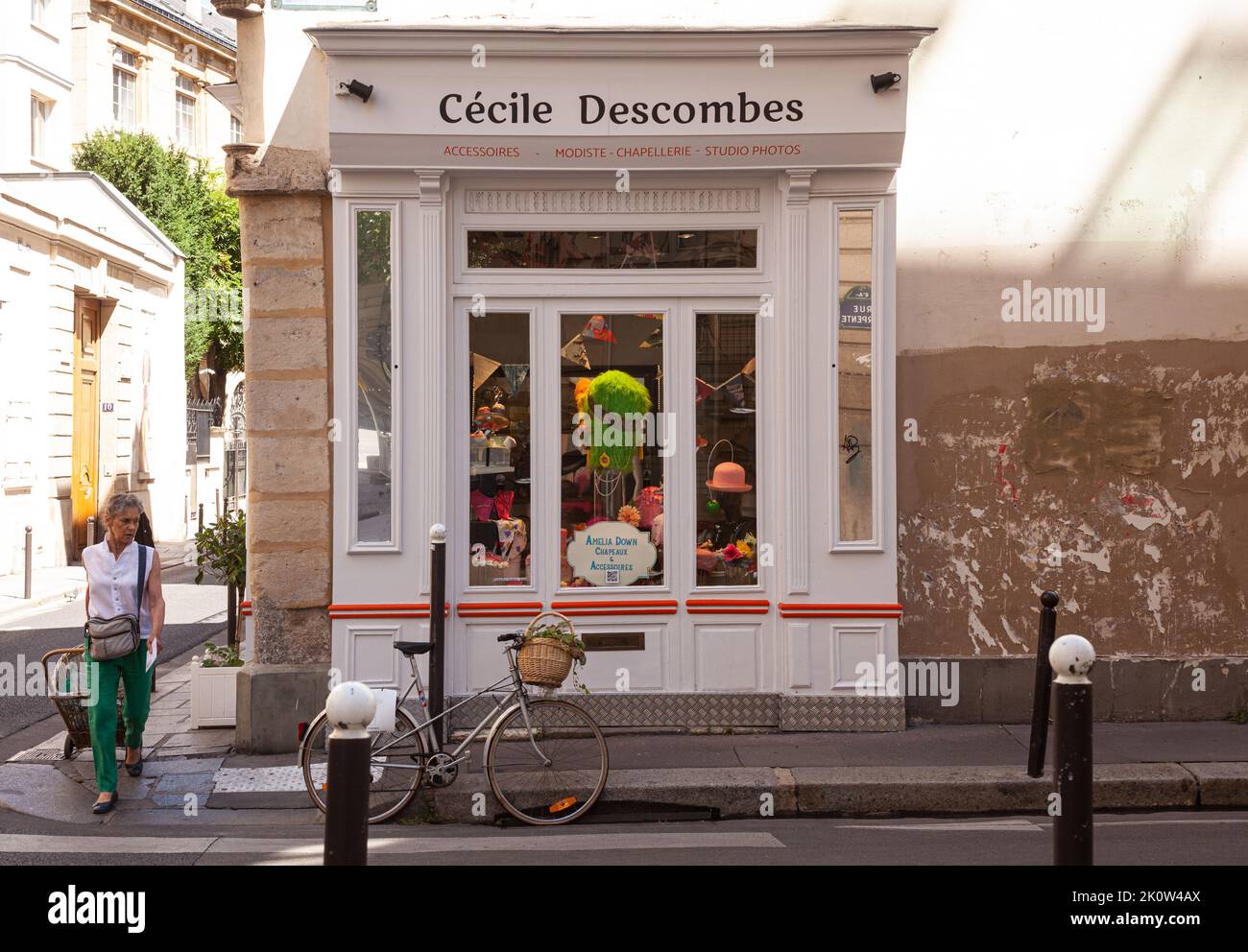 Paris, France - July, 15: Window of the accessories shop Cécile Descombes in the typical french street with shops on the first floor in house. Vintage Stock Photo