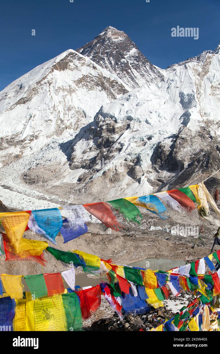 view of Mount Everest with buddhist prayer flags from Kala Patthar, way to Everest base camp, Sagarmatha national park, Khumbu valley, Solukhumbu, Nep Stock Photo