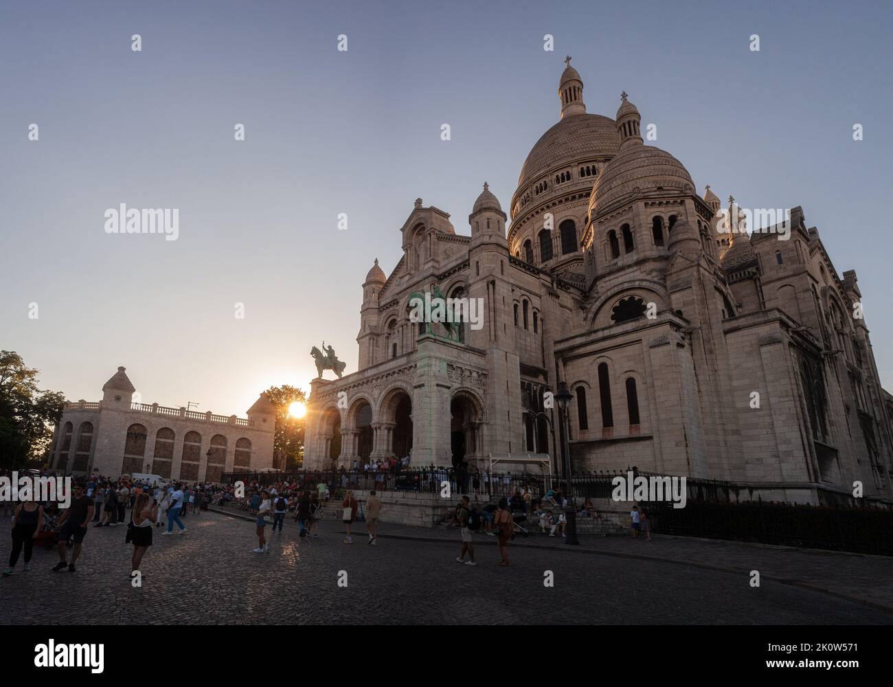 Paris, France - July, 15: Basilica of the Sacred Heart at sunset, commonly known as Sacre-Cœur Basilica on July 15, 2022 Stock Photo