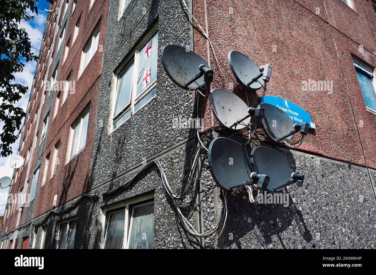 Satellite dishes on tower block on 1960's housing estate, Barking, East
