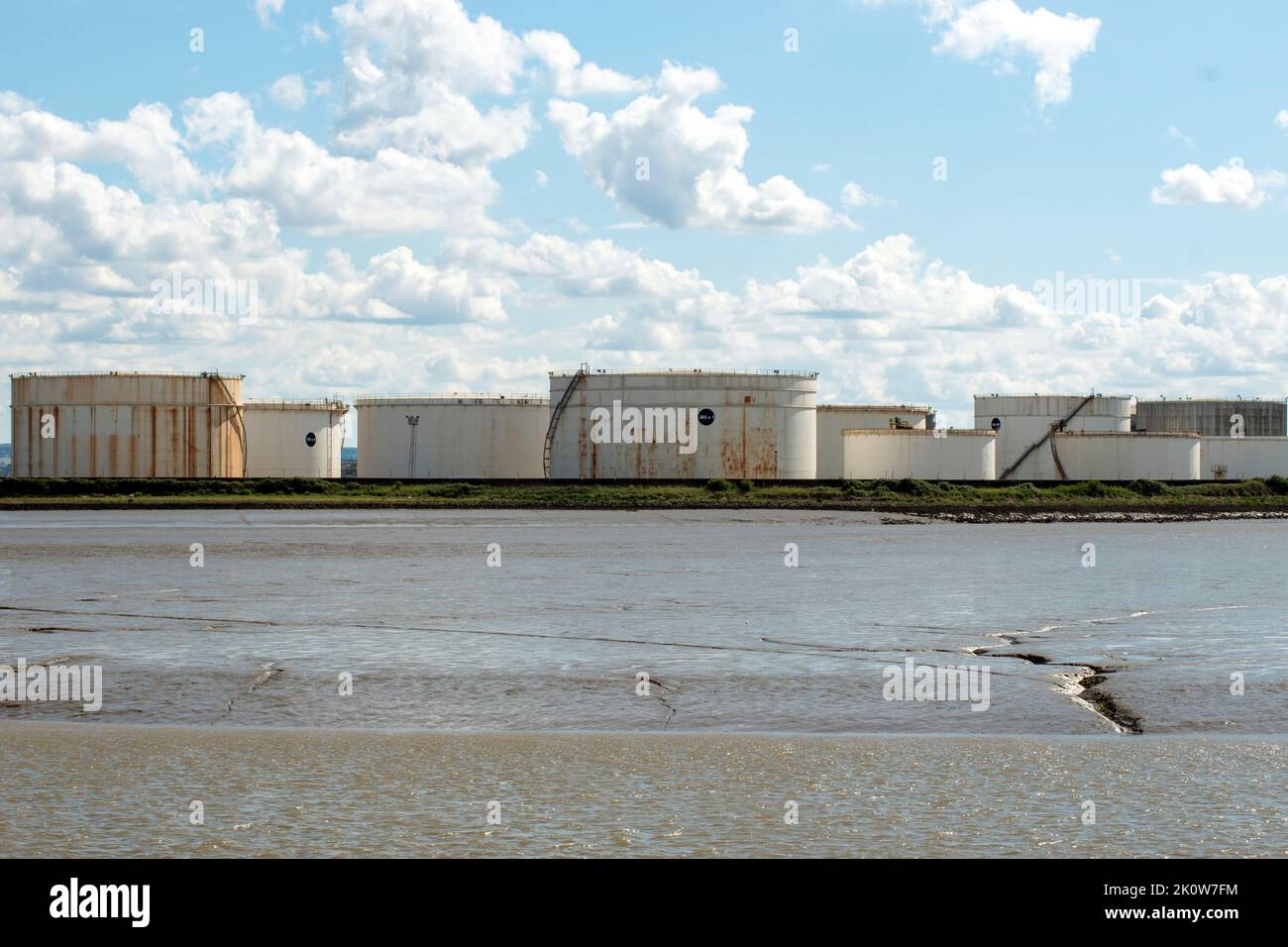 Oil storage tanks at Coryton Refinery in Essex, England, on the estuary of the River Thames, England, UK. Stock Photo