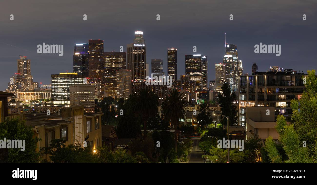 Los Angeles skyline at night viewed from a local neighborhood Stock Photo