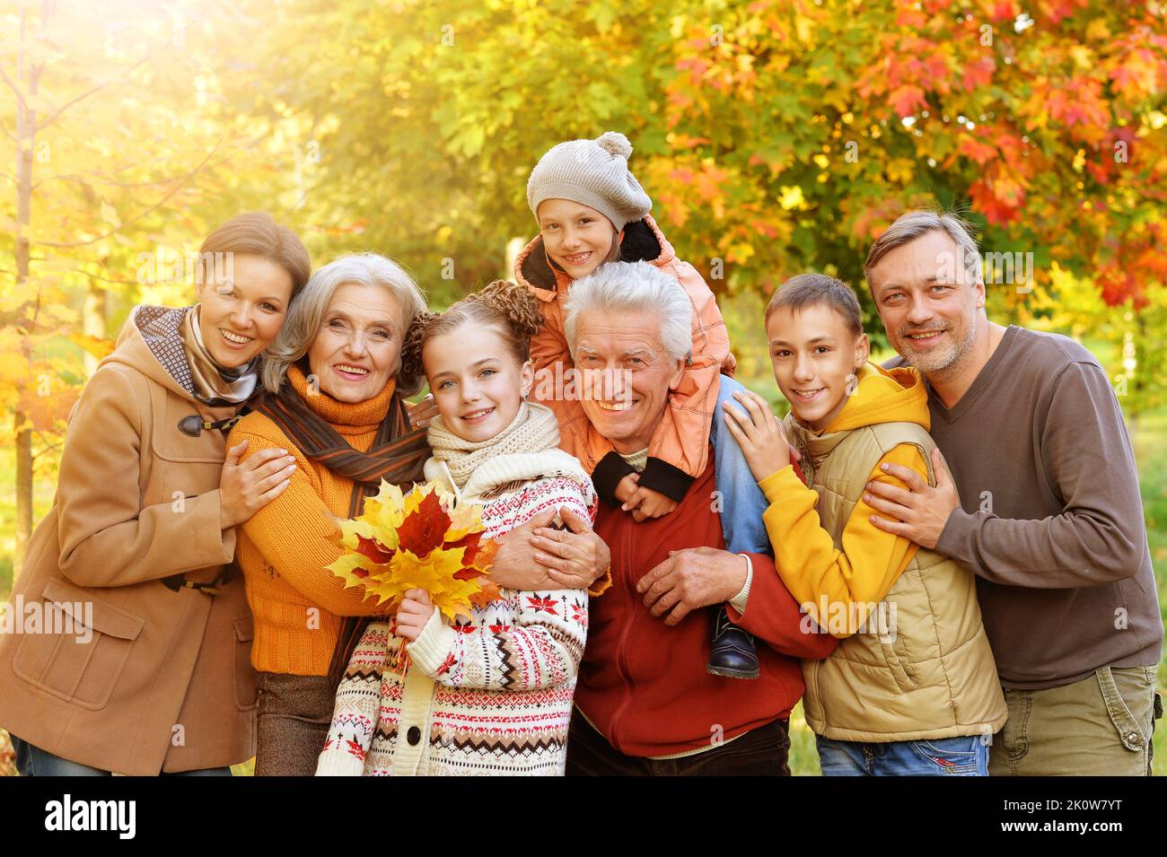 Portrait of a large family of seven in autumn Stock Photo