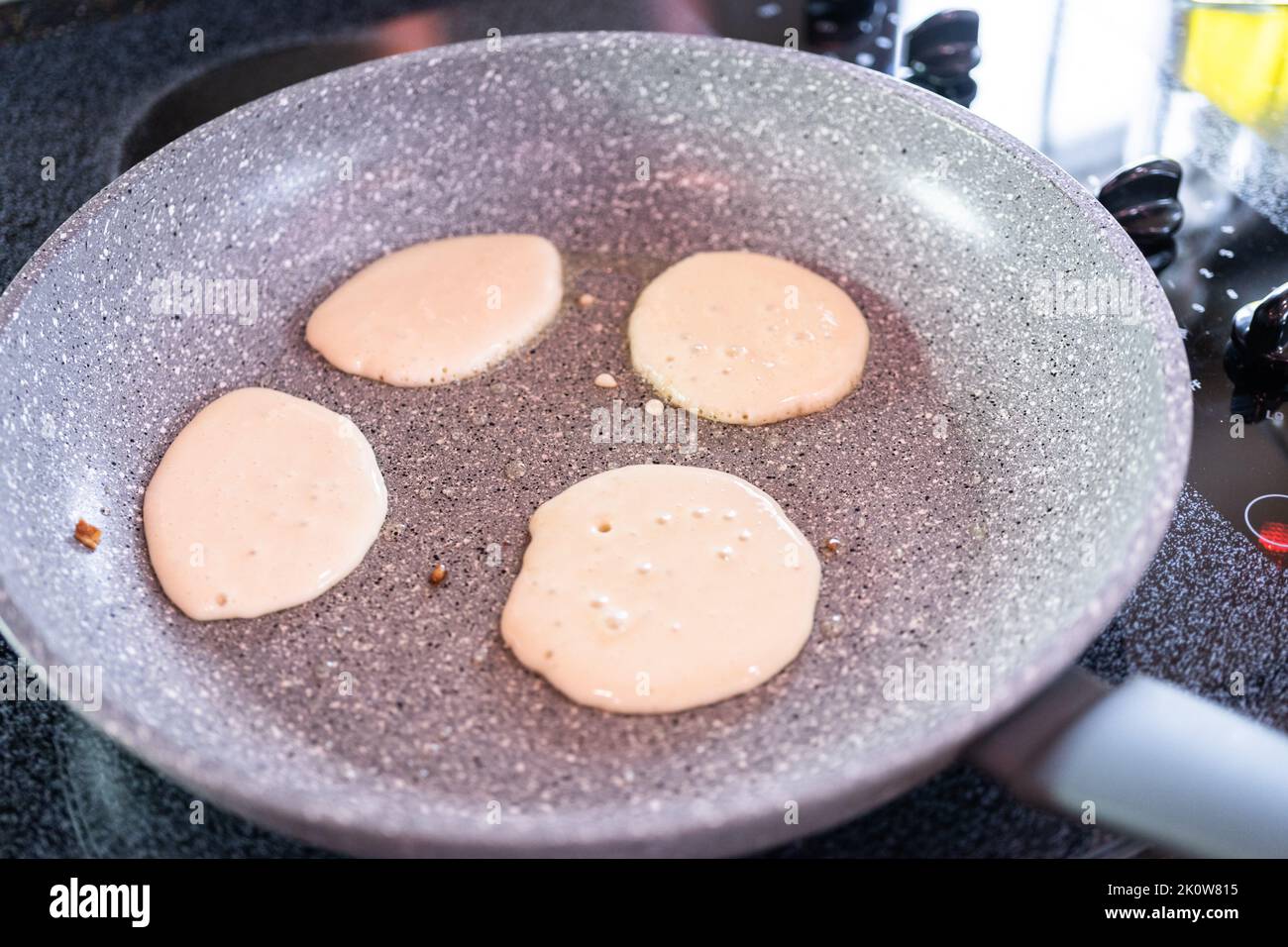 Making pancakes Stock Photo