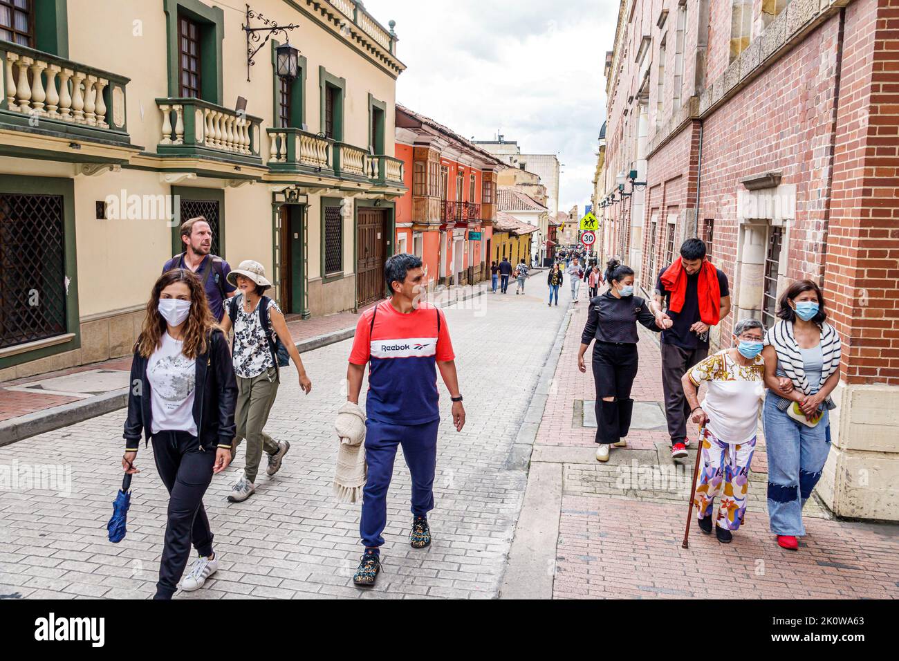 Bogota Colombia,La Candelaria Centro Historico central historic old city center centre Calle 5,colorful houses colonial architecture pedestrians walki Stock Photo