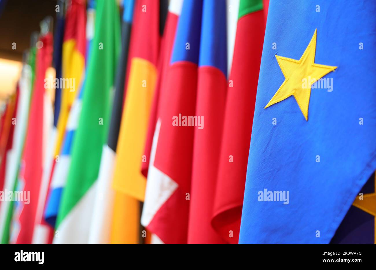yellow star on a blue background of the flag of the European Union and ...