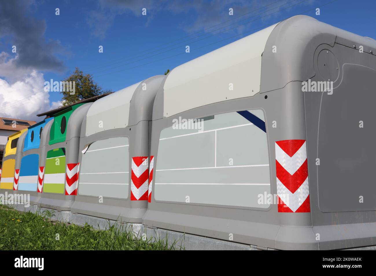 Five bins for separate waste collection where you can throw away rubbish plastic glass paper