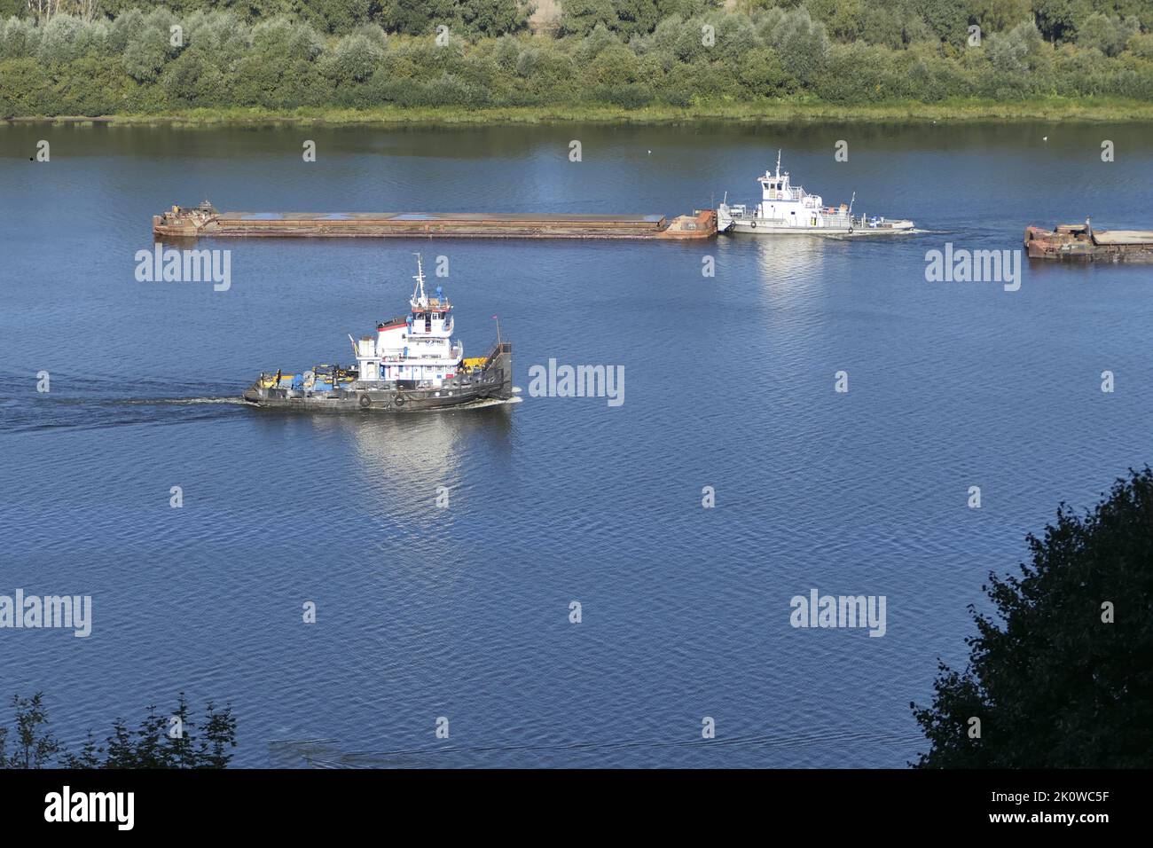 Water transport carrying goods along the river. . High quality photo Stock Photo