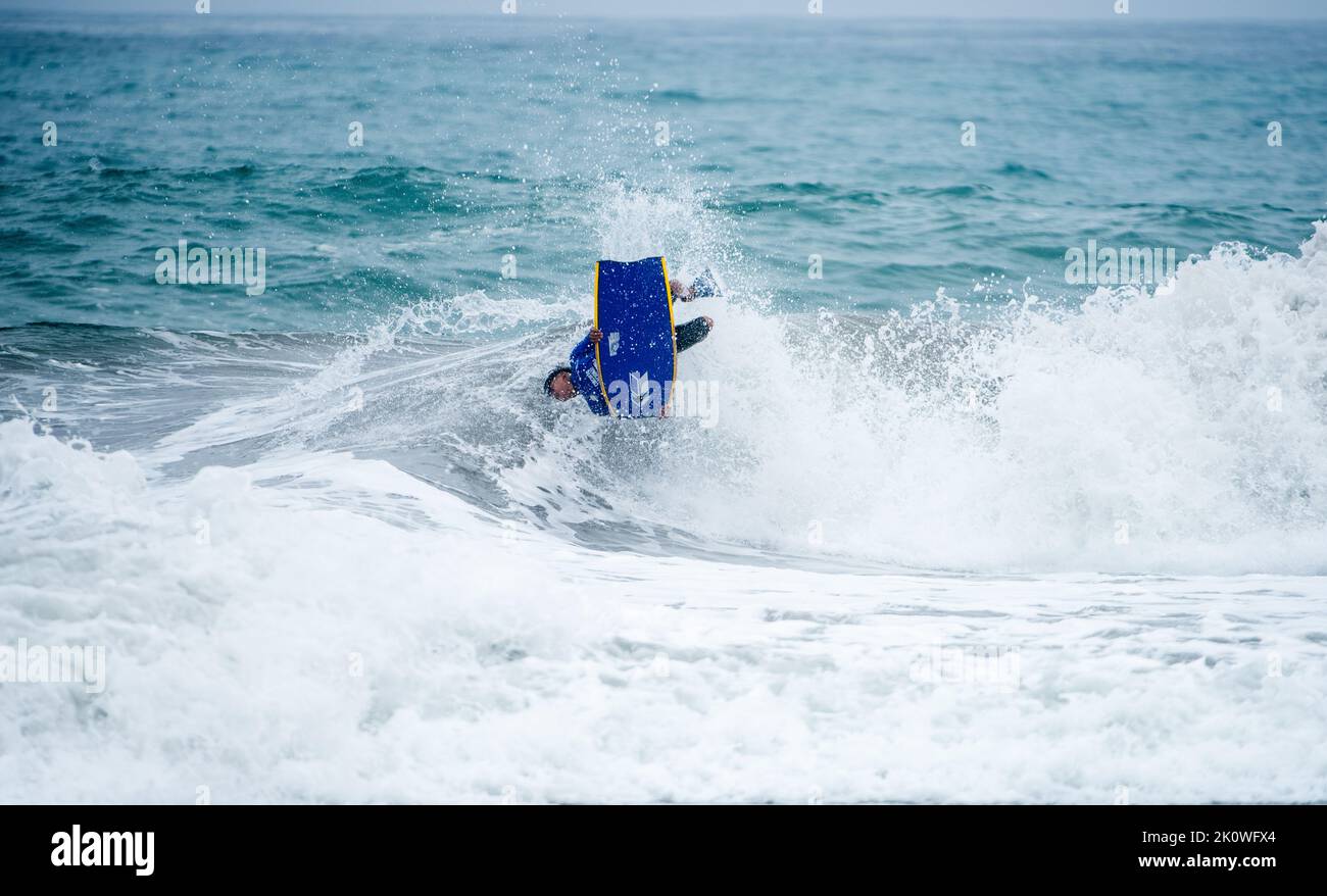 Bodyboarder in action on the ocean waves on a sunny day. nice Stock ...