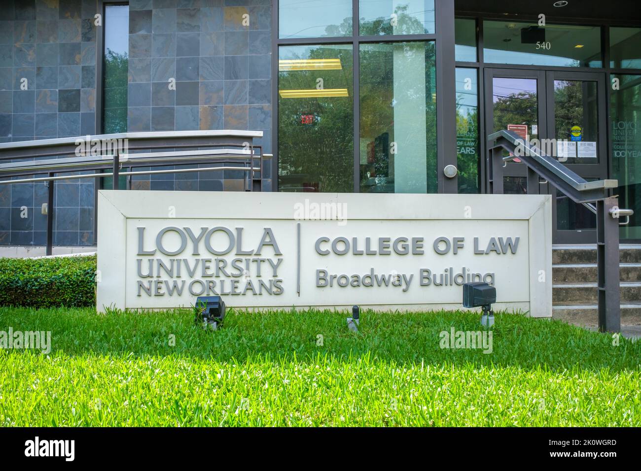 NEW ORLEANS, LA, USA - SEPTEMBER 7, 2022: Sign and entrance to Loyola University New Orleans College of Law Broadway Building Stock Photo
