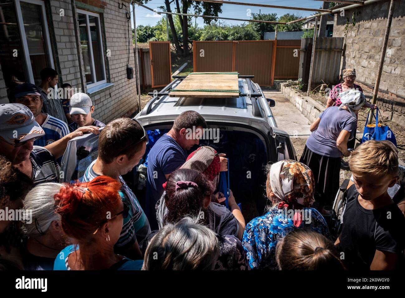 Slovyansk, Oblast, Ukraine. 27th July, 2022. Residents receive
