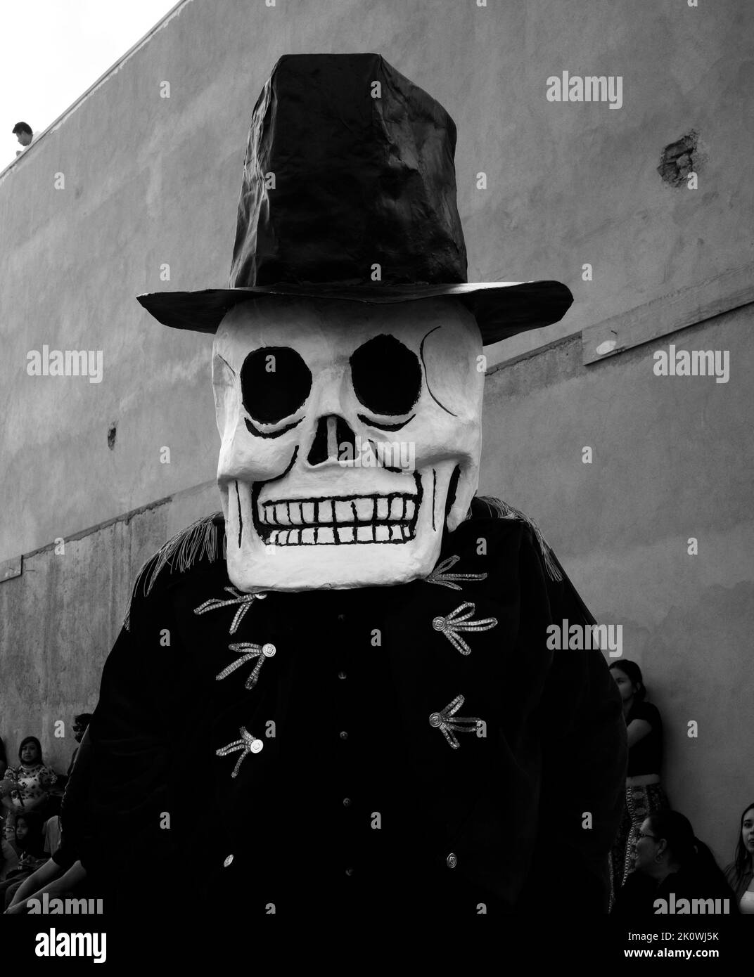 A person in a scary skull costume during the Los Locos festival in San Miguel de Allende, Mexico Stock Photo