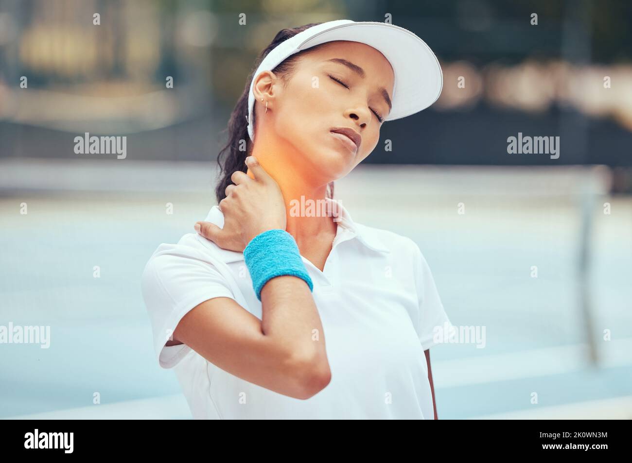 Girl with neck pain after tennis game, muscle injury after sports training on court and emergency health insurance accident after sport. Professional Stock Photo
