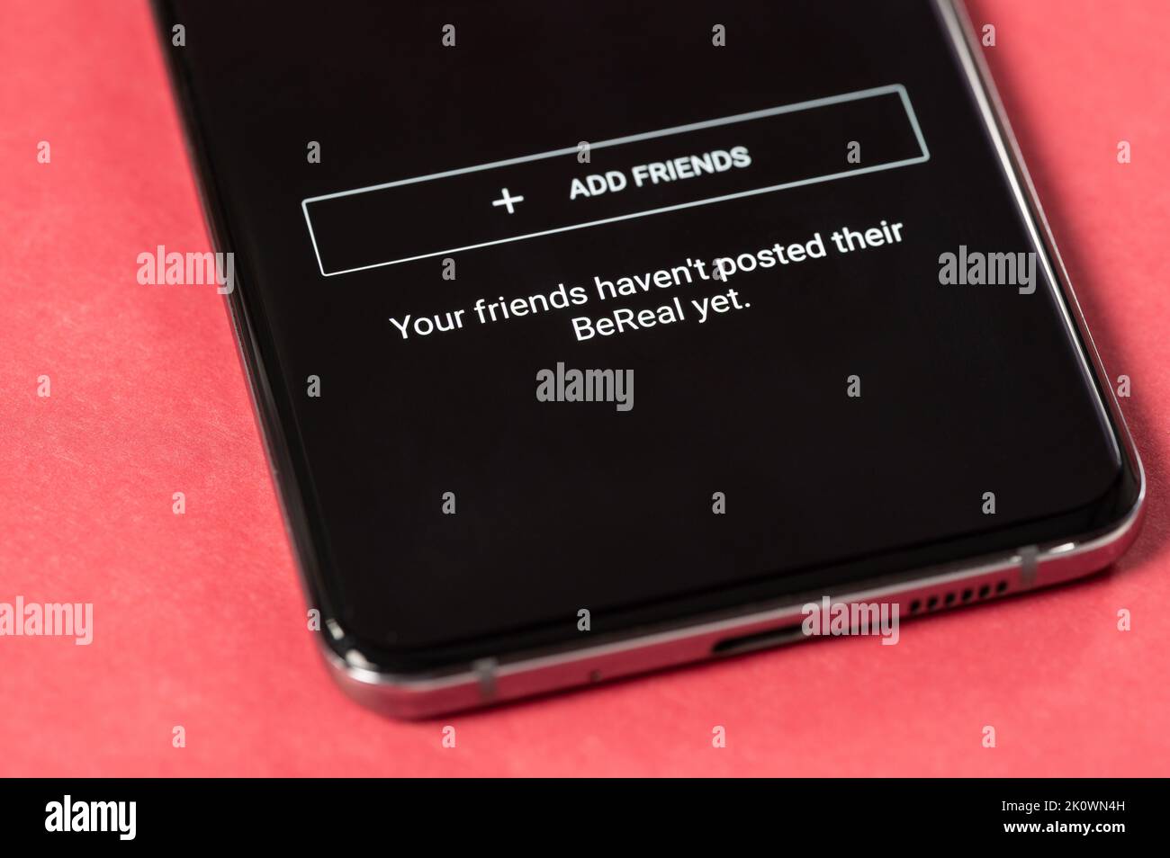 New york, USA - september 13, 2022: Adding friends in new trending Bereal app on smartphone screen macro close up view background Stock Photo