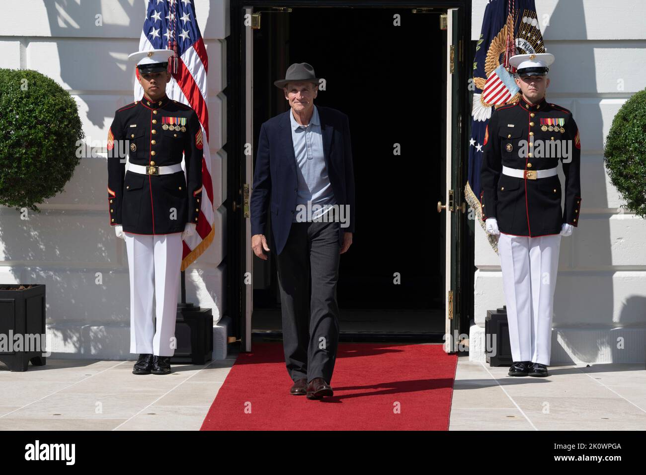 James Taylor arrives at an event celebrating the passage of H.R. 5376