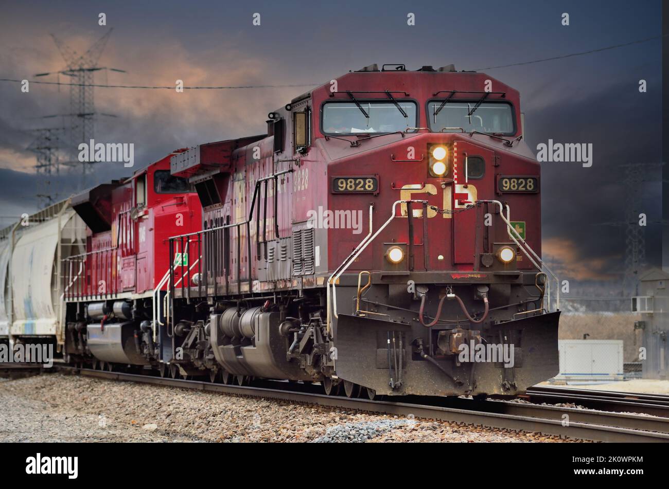Bartlett, Illinois, USA. A pair of Canadian Pacific Railway locomotives lead a freight train eastbound through the Chicago suburbs. Stock Photo
