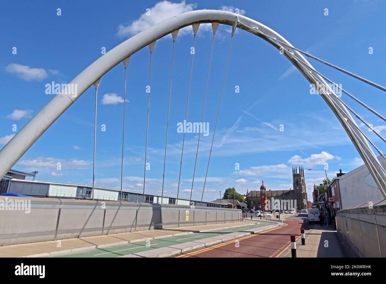 The white Bolton arch in Newport Street, leading from Bolton railway station and interchange away to Holy Trinity Church, Trinity Street, town centre Stock Photo