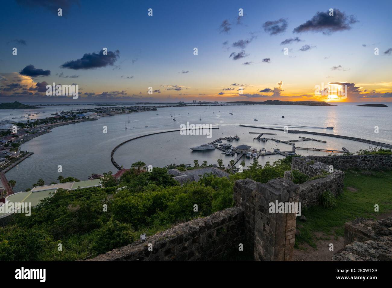 Sunset view from Fort Louis overlooking the harbour at Marigot on the French side of the Caribbean island of St Martin Stock Photo