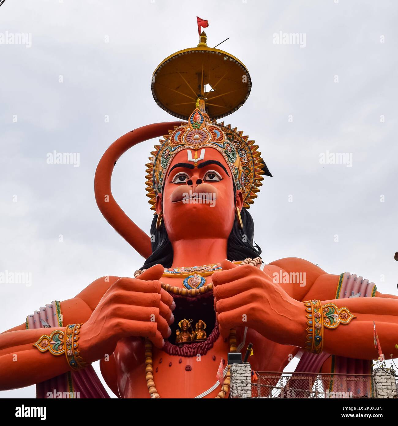 Big statue of Lord Hanuman near the delhi metro bridge situated near Karol Bagh, Delhi, India, Lord Hanuman statue touching sky Stock Photo