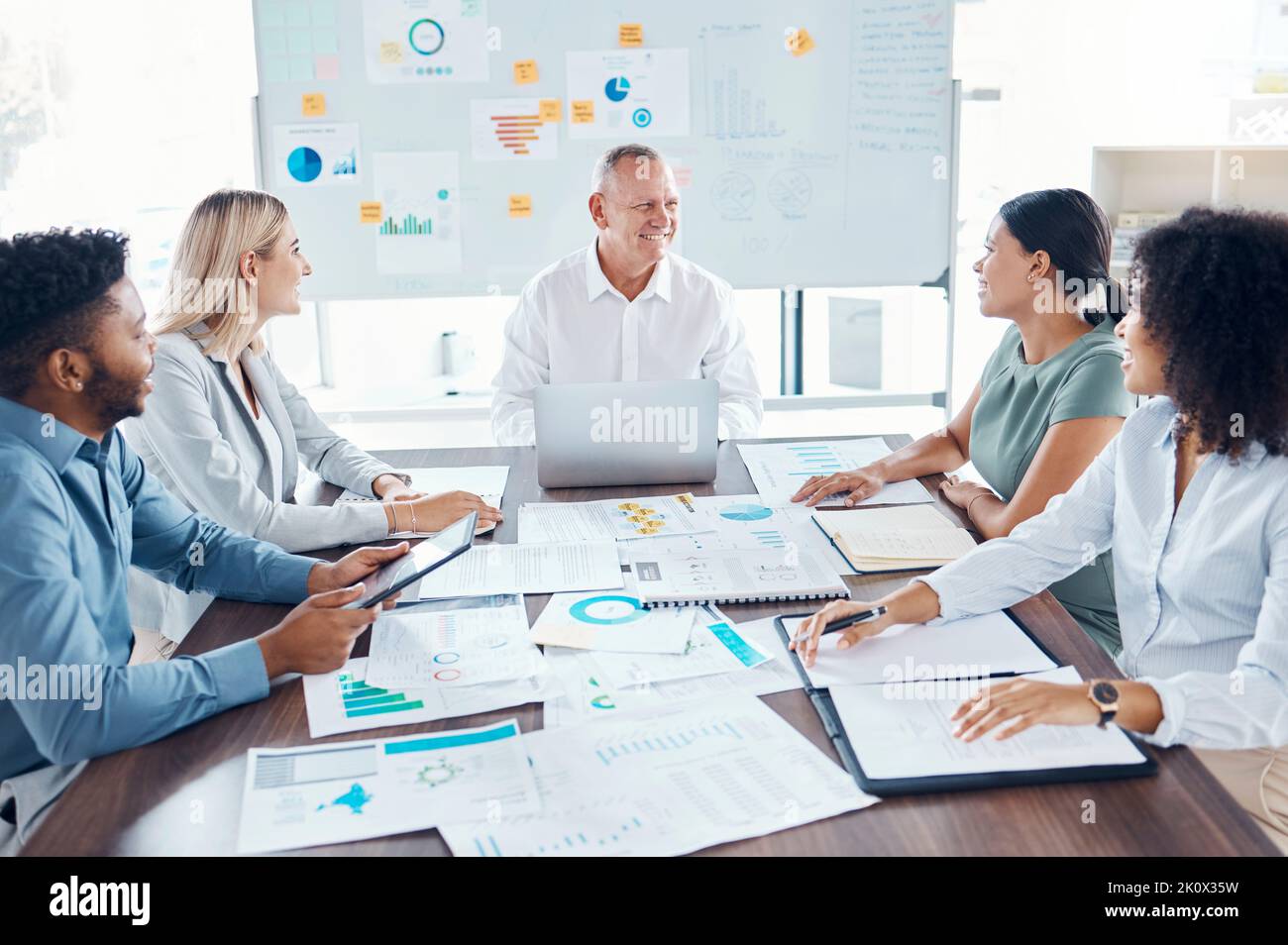 Business meeting with data, chart and graphs showing sales, financial profit or customer online banking trend. Teamwork, collaboration and Stock Photo