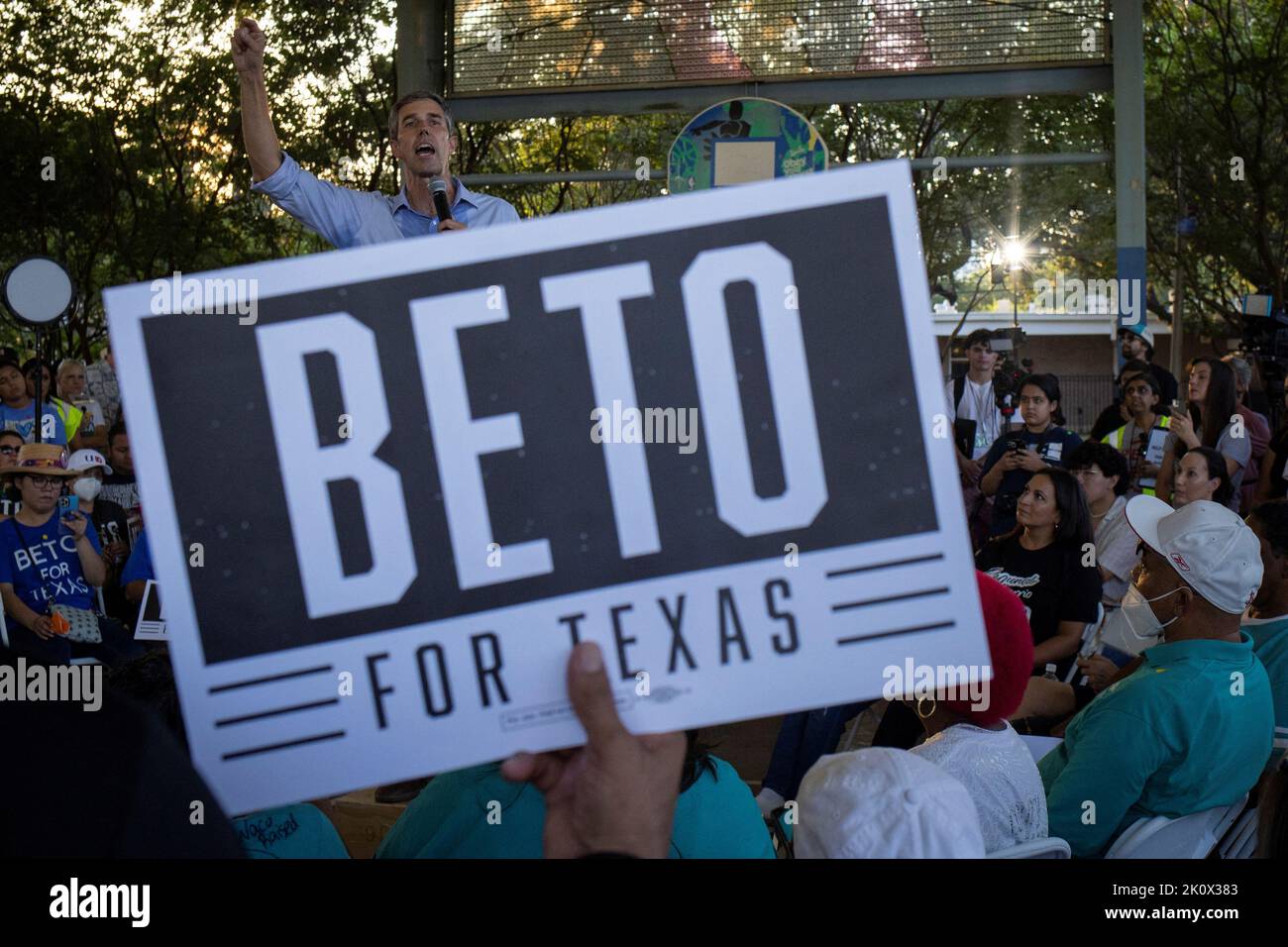 A supporter holds a sign as Texas Democratic gubernatorial candidate and former U.S. congressman Beto O'Rourke speaks to supporters at a campaign event in Houston, Texas, U.S. September 13, 2022. REUTERS/Adrees Latif Stock Photo