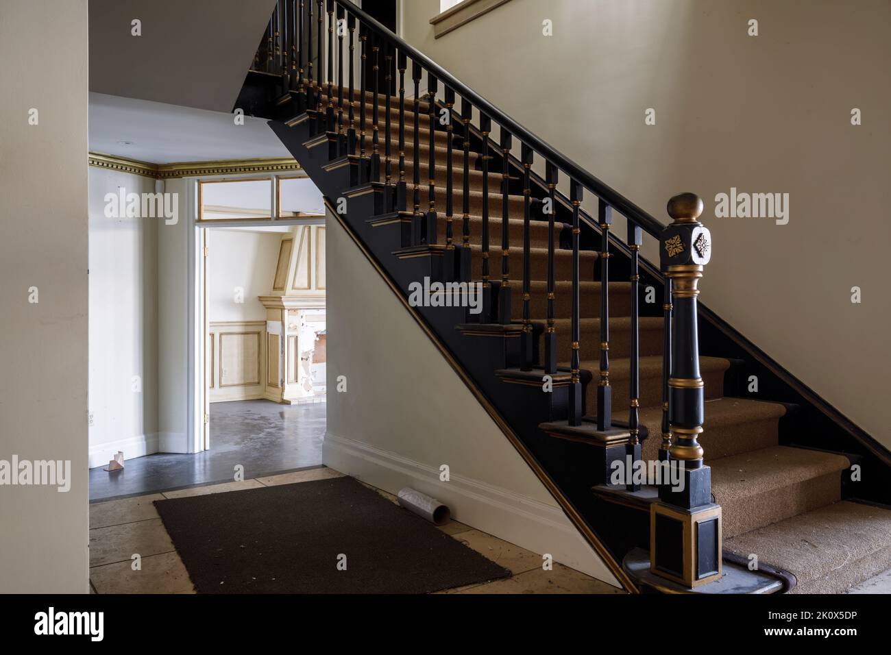 A staircase inside a home. This home has since been demolished. Stock Photo