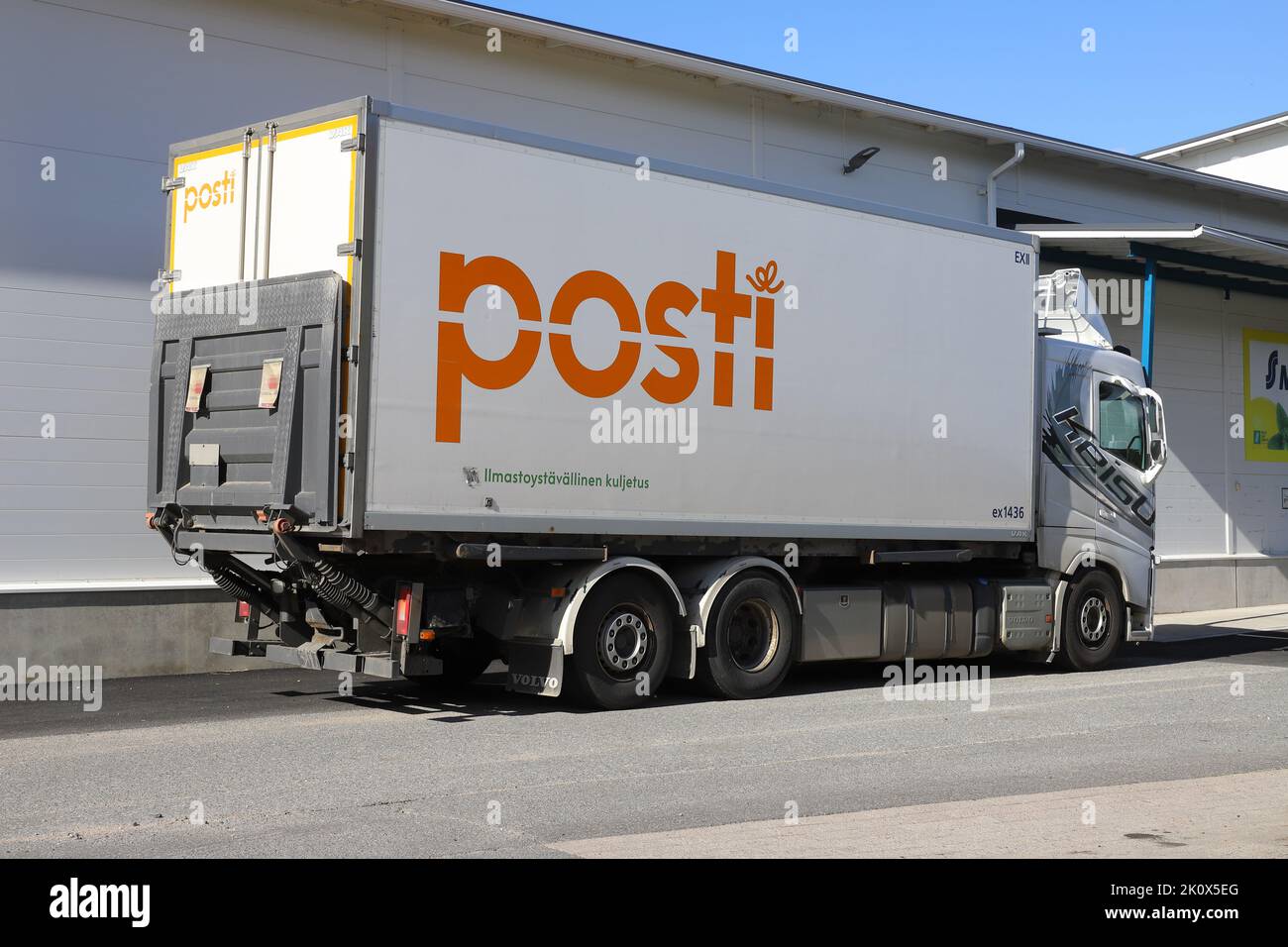 Ylitornio, Finland - August 29, 2022: The Finnish national postal service Posti parcel delivery truck outside the S Market super market. Stock Photo
