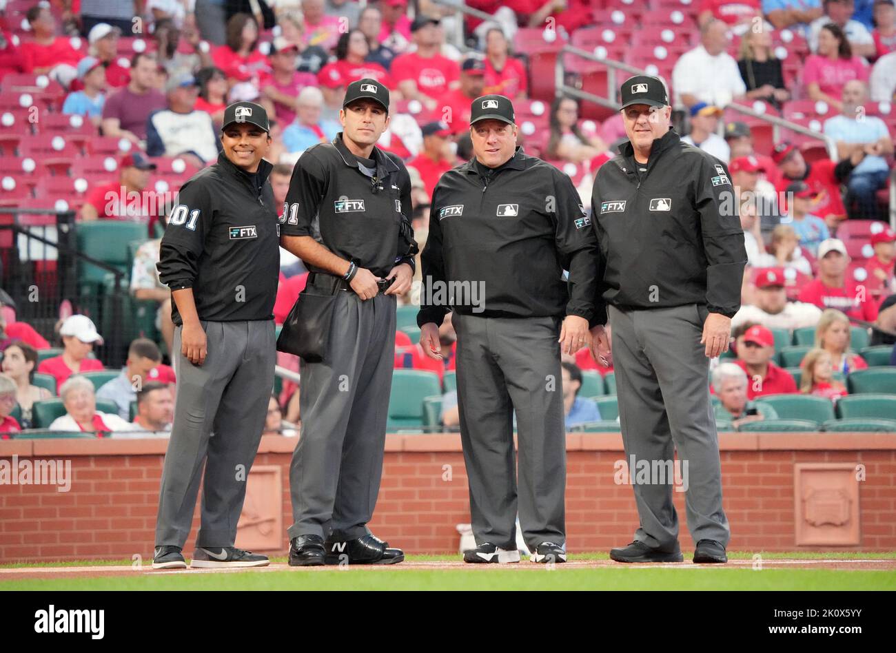 Major League umpire Erich Bacchus looks on during the game between News  Photo - Getty Images