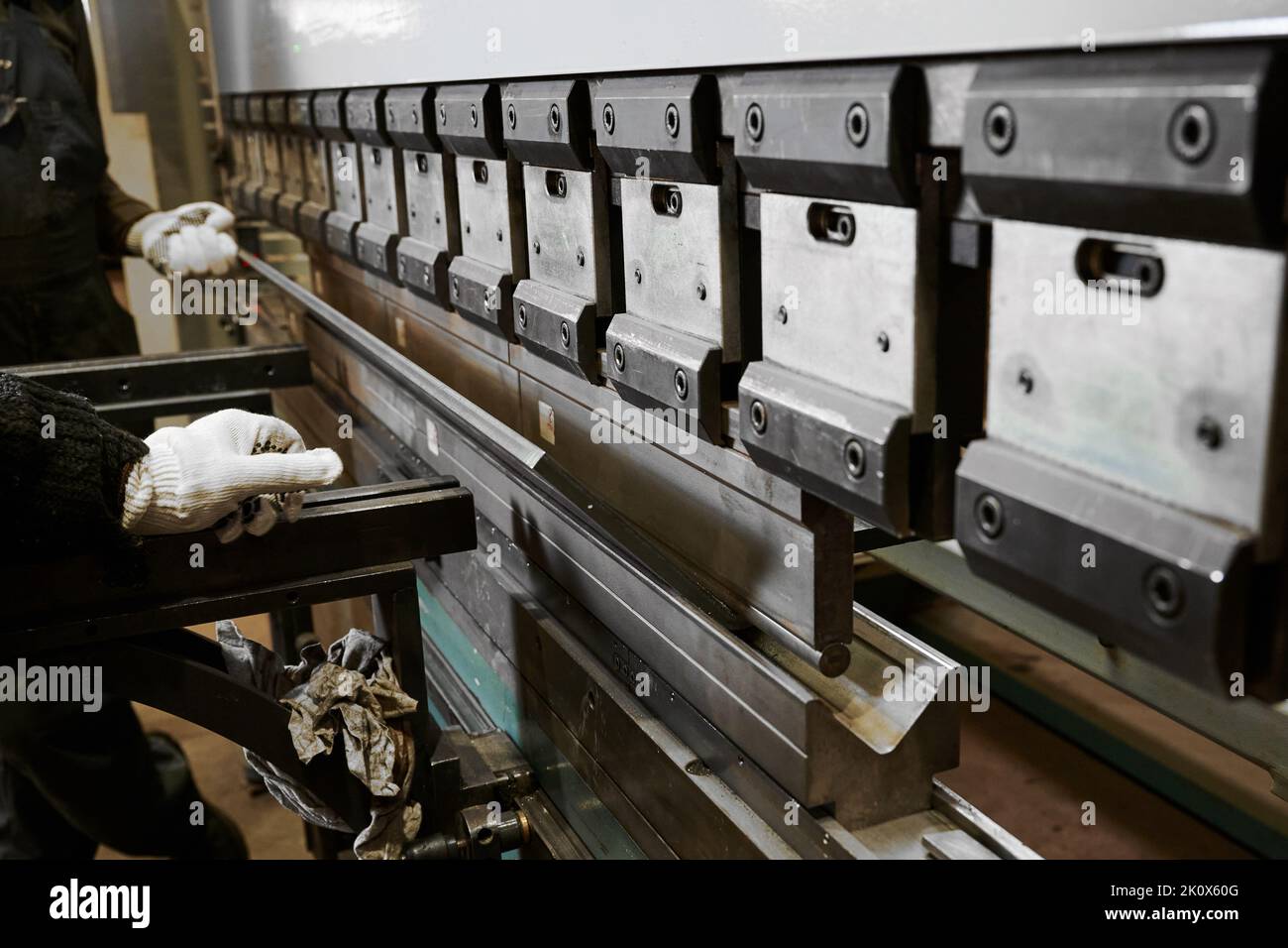 Bending press operates with metal sheet in plant Stock Photo Alamy