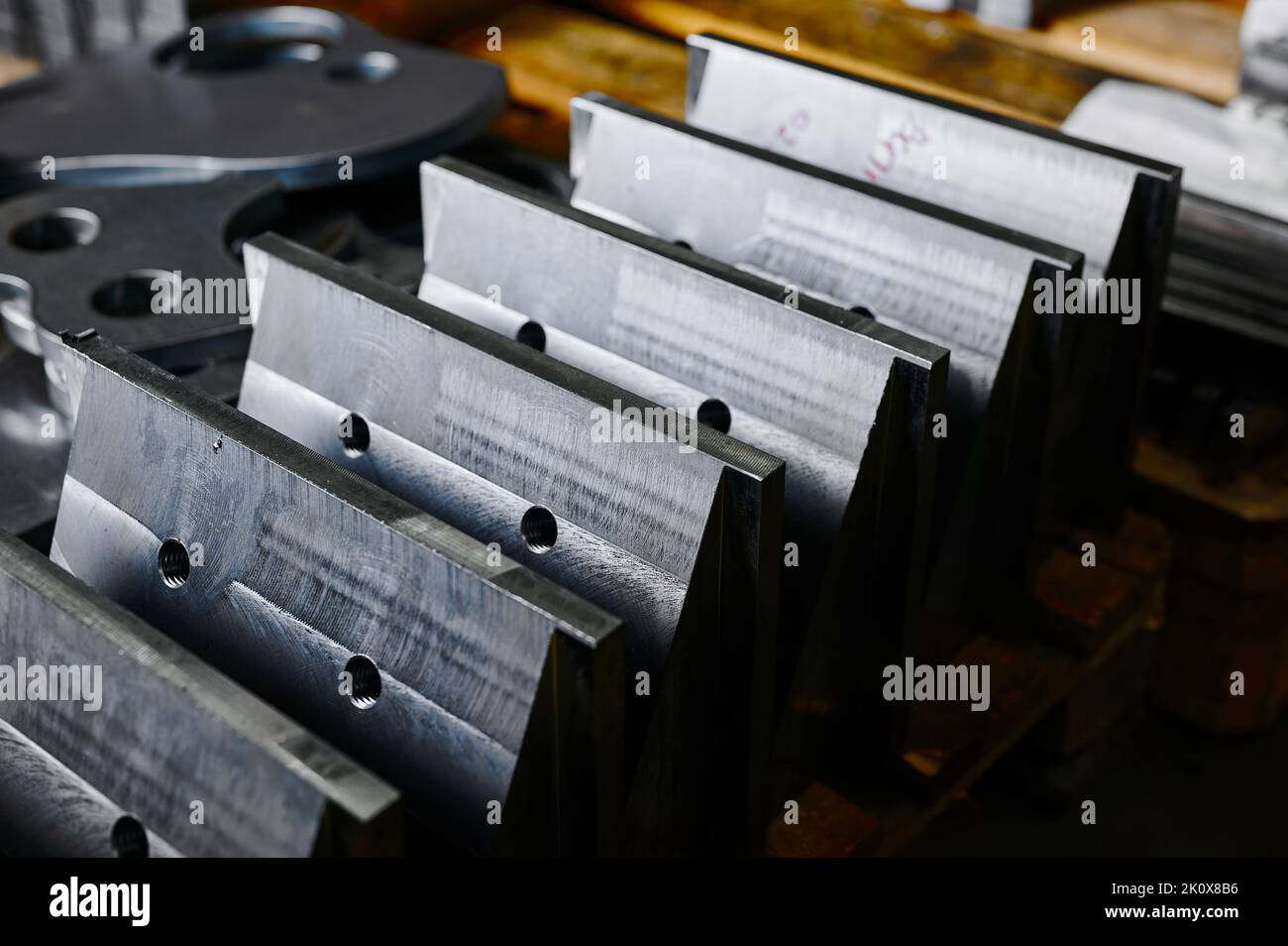Processed metal plates with ground edges in warehouse Stock Photo Alamy