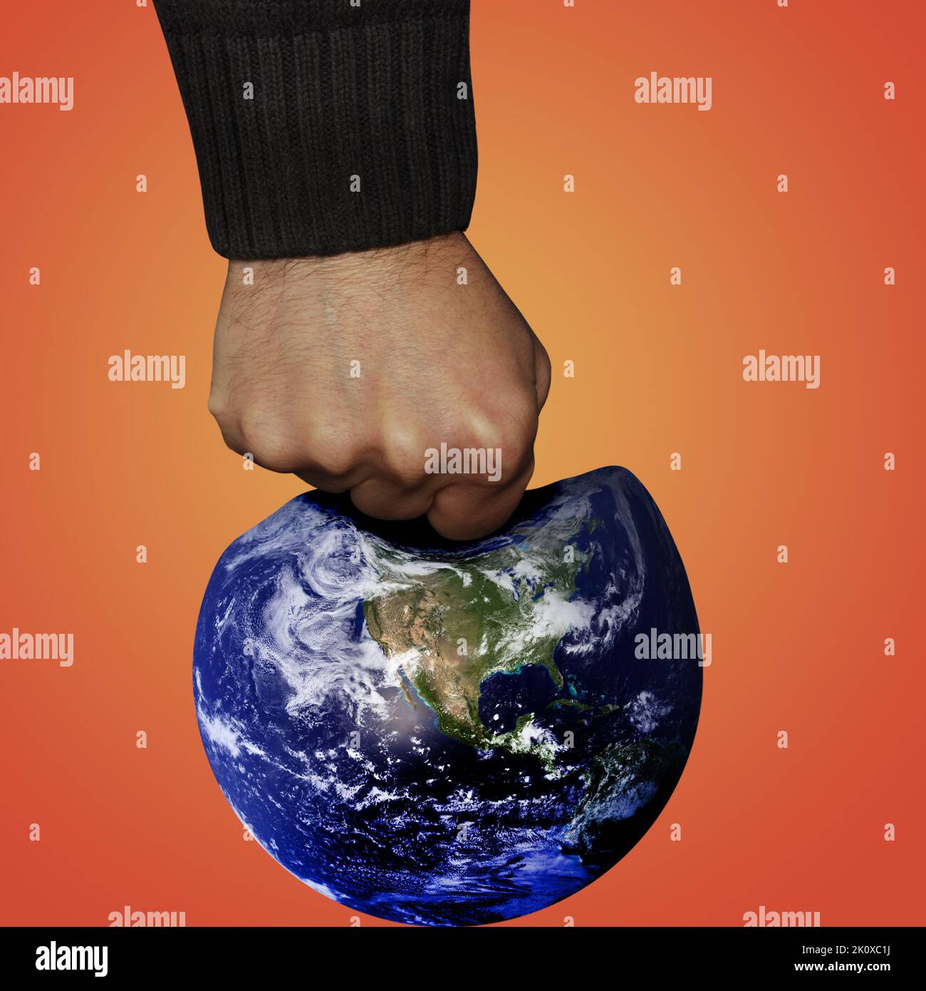 squeezing the Earth, overshoot day concept Stock Photo