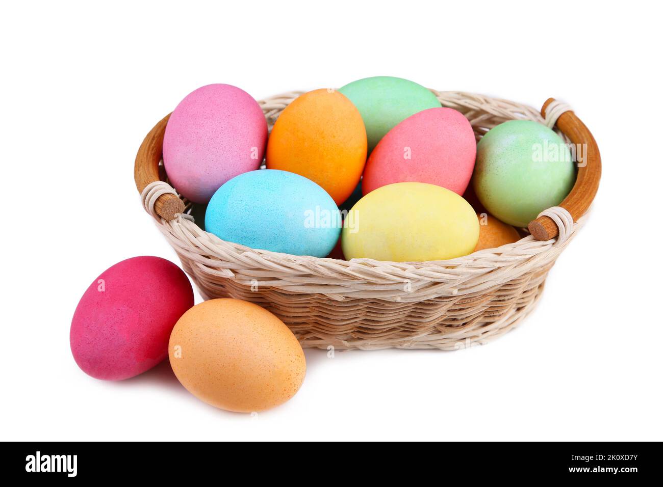 Colorful easter eggs in basket isolated on white Stock Photo - Alamy
