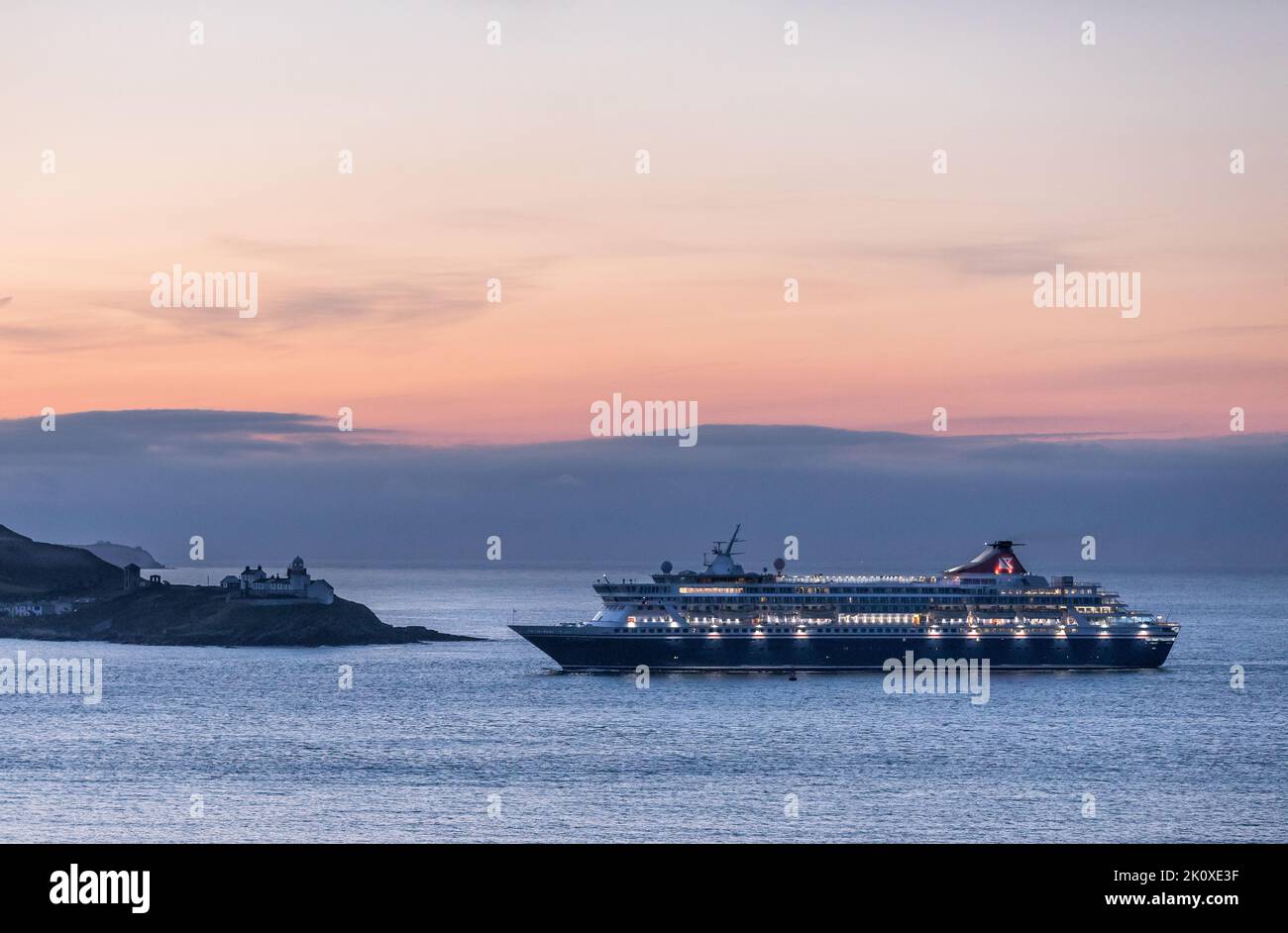 Roches Point, Cork, Ireland. 14th September, 2022.Cruise ship passing the Roches Point Lighthouse before dawn as she steams into the port on her way to Cobh, Co. Cork, Ireland. - Picture David Creedon Credit: David Creedon/Alamy Live News Stock Photo