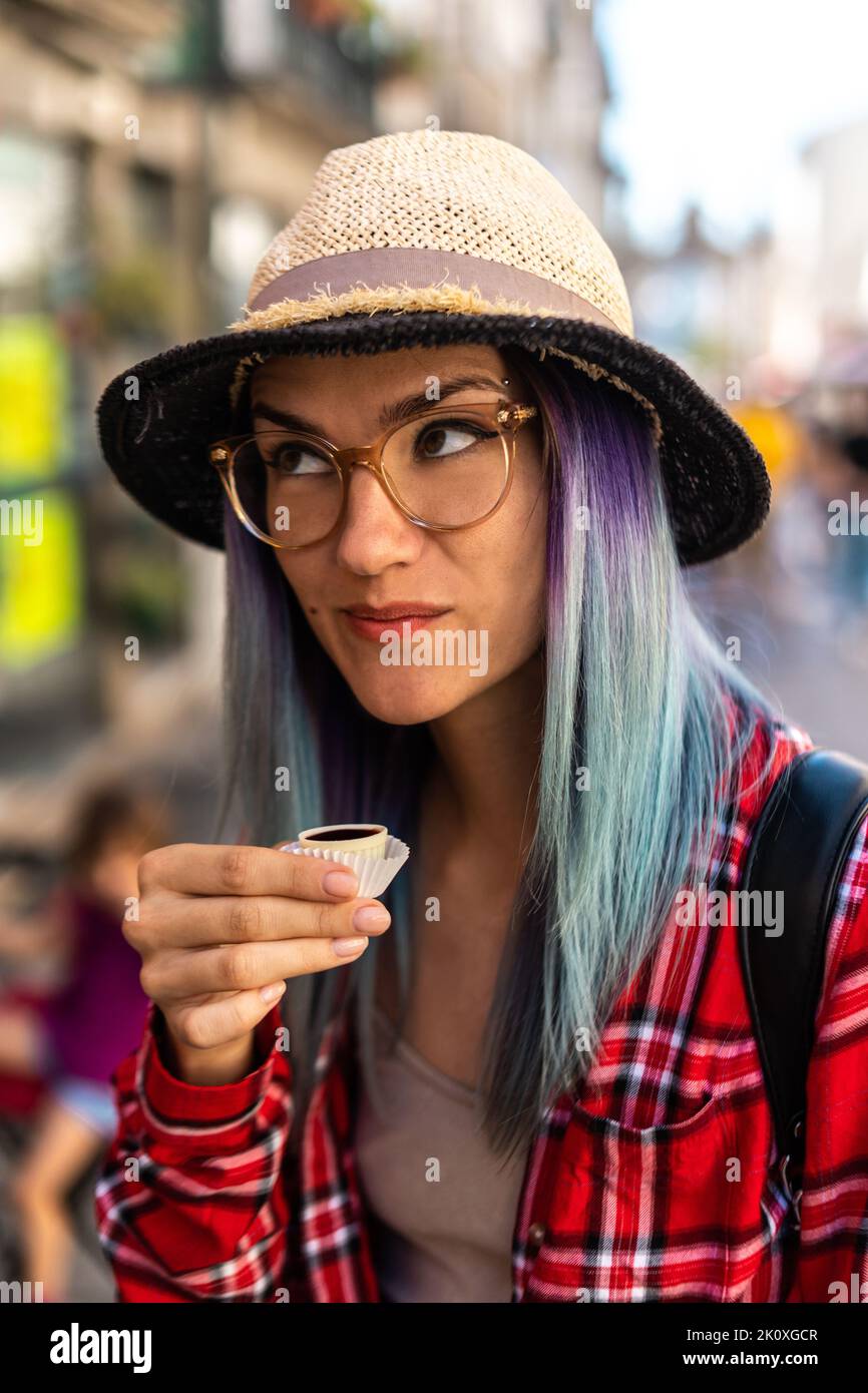 Tourist drink ginja - traditional portuguese cherry liqueur Stock Photo