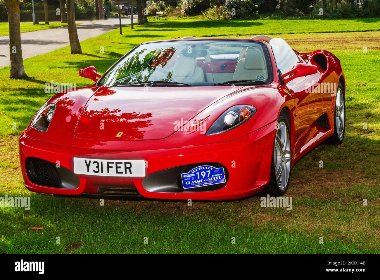 2005 Red FERRARI 4308cc Petrol 5 speed manual sports car Cabrio at the Southport Classic car and Speed event in Victoria Park, UK Stock Photo