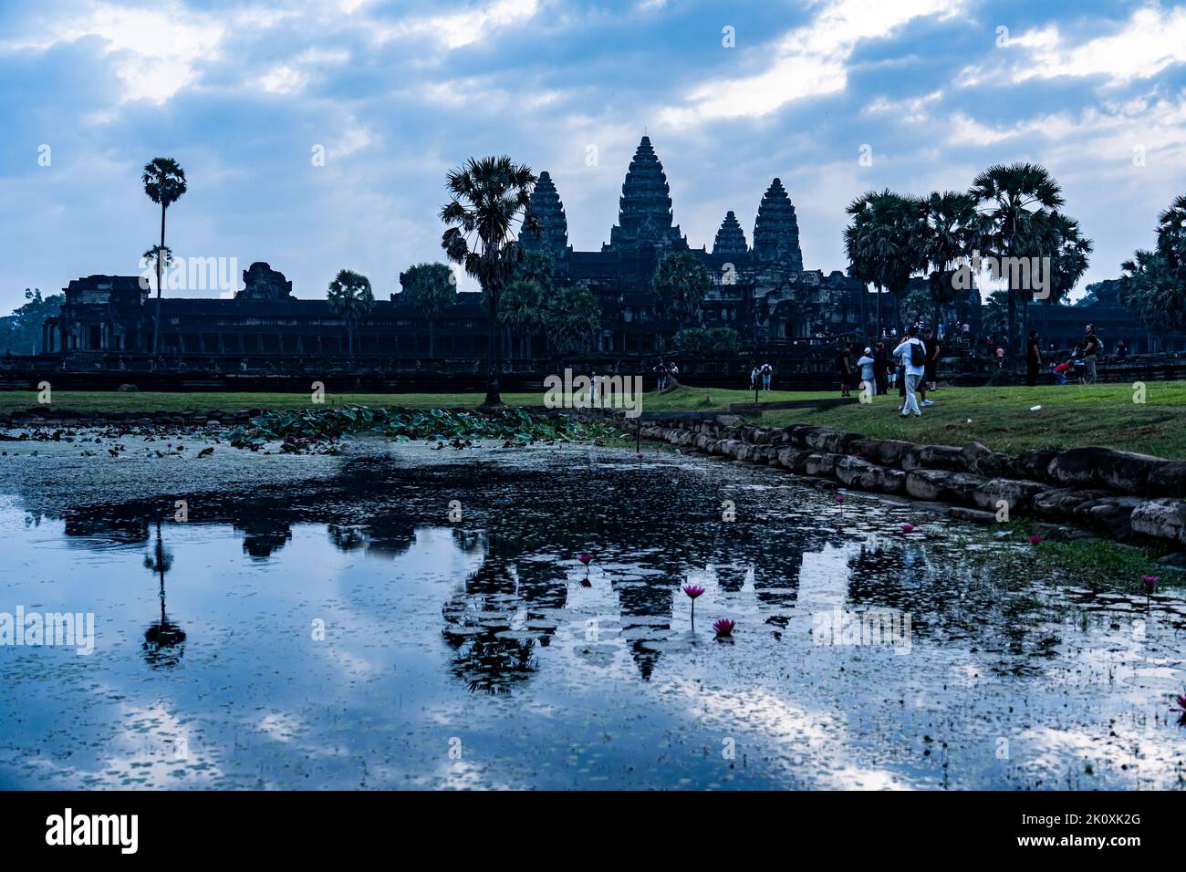 Cambodia. Siem Reap Province. A silhouette of Angkor Wat (Temple City) and its reflection in the lake at early morning.  A Buddhist and temple complex Stock Photo