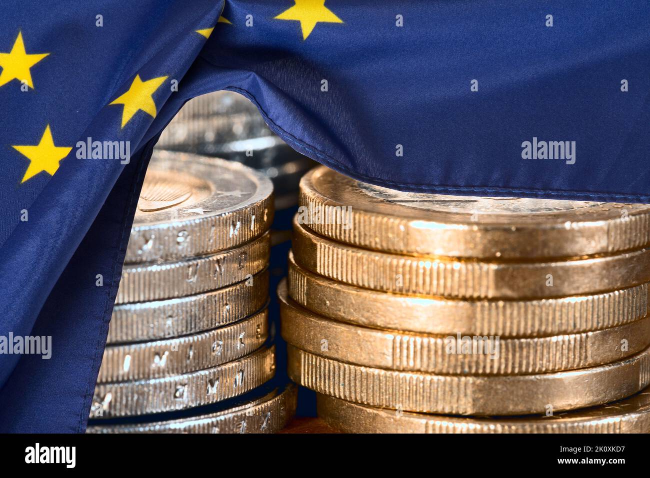 European Union flag and euro coins Stock Photo