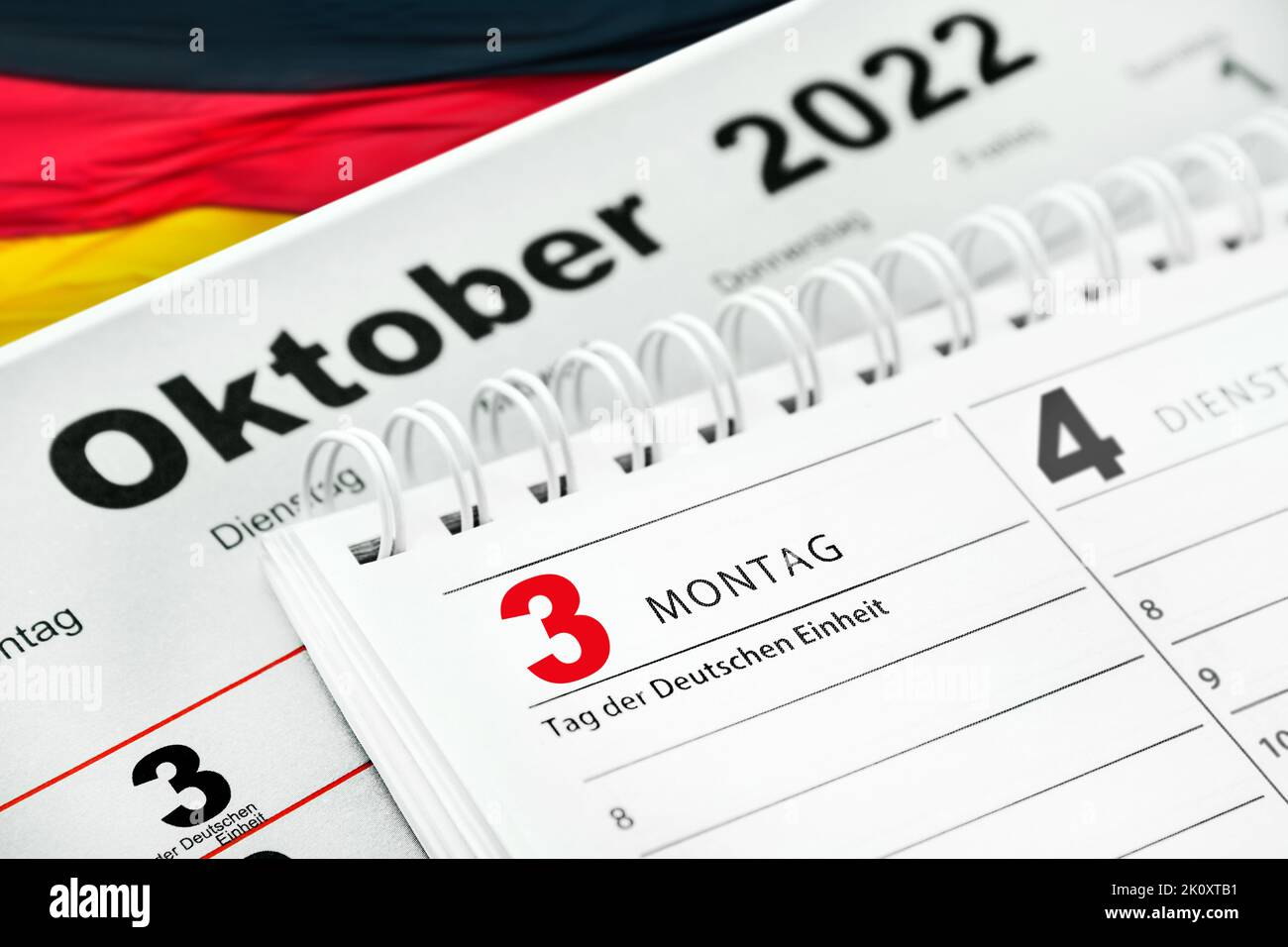 Tag der Deutschen Einheit mit Kalender 3. Oktober 2022 und Flagge Stock Photo