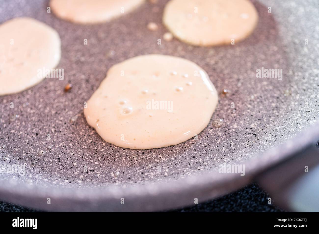 Making pancakes Stock Photo