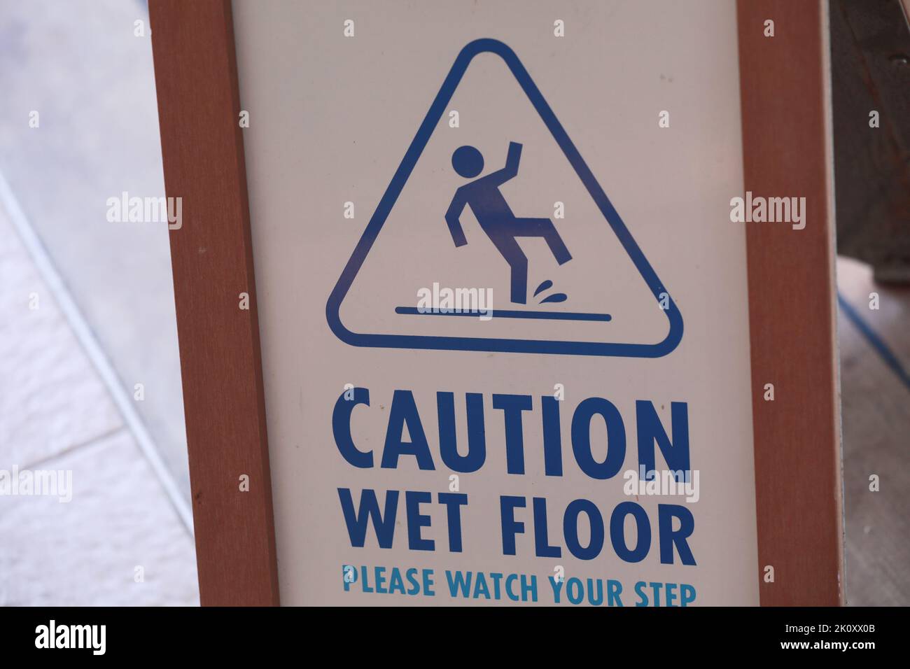 Caution wet floor or cleaning in progress. A yellow sign warning for