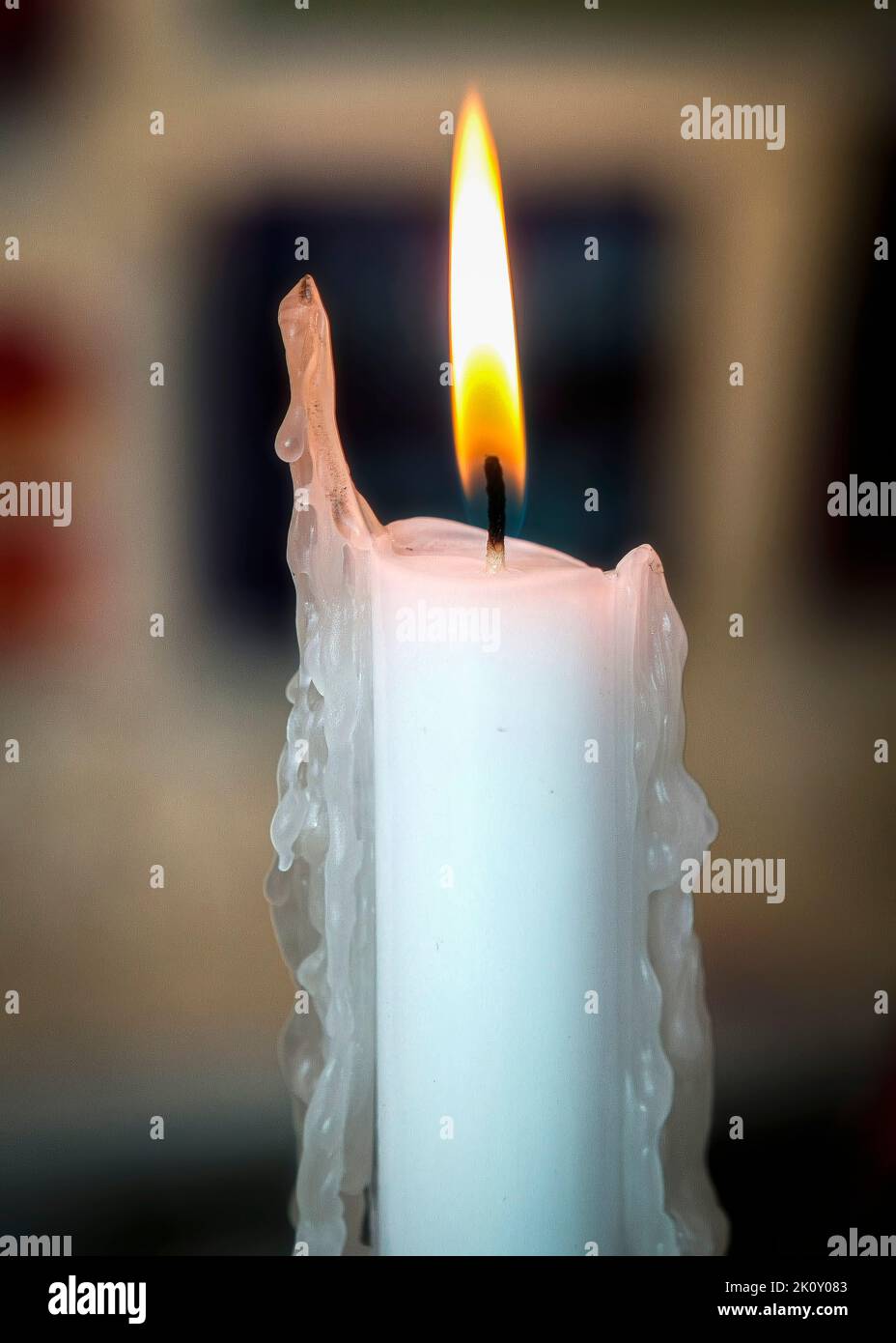The low light and soft evening glow of a candle Stock Photo