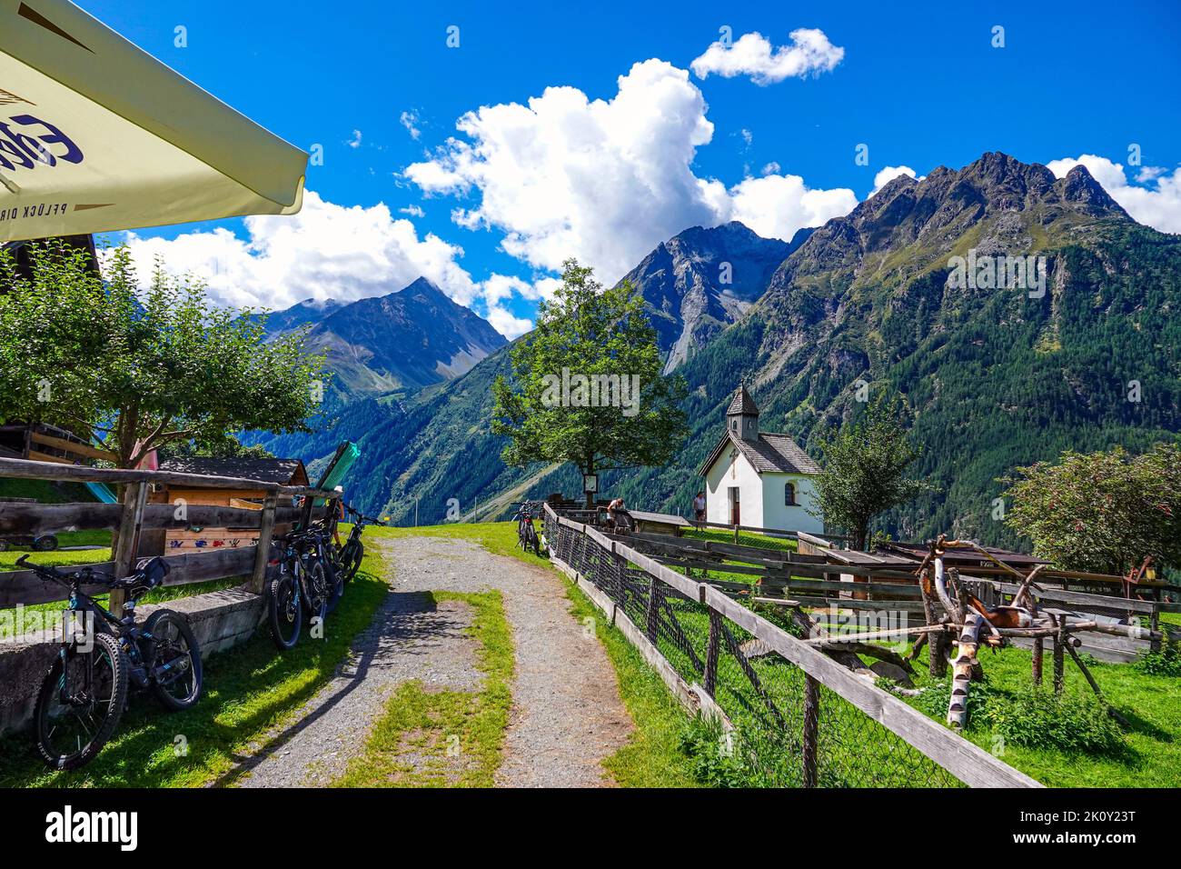 Tiny white chapel above Langenfeld, in the Otztal Valley, the Tirol, Austria, EU, the European Alps Stock Photo