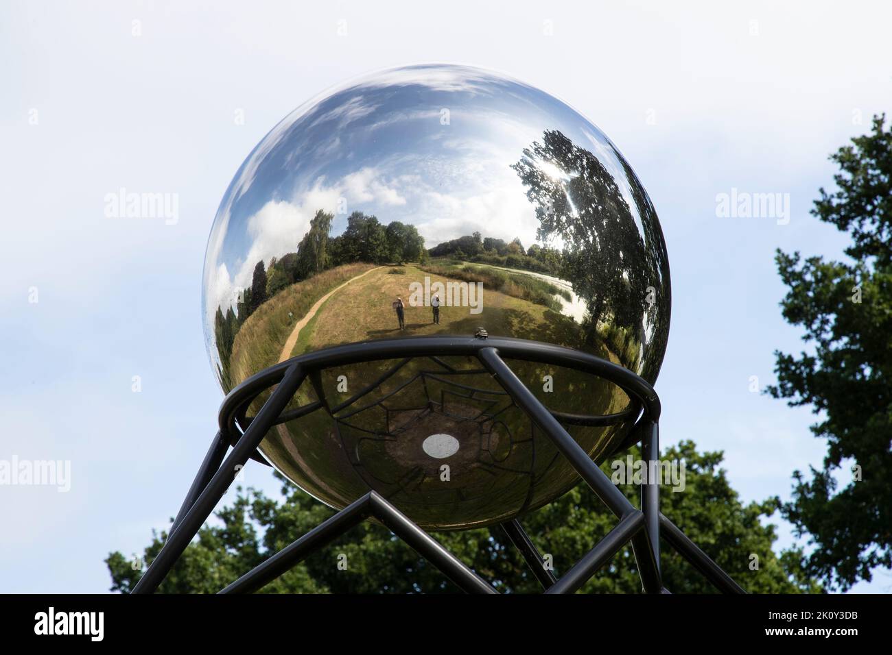 A close up of the large mirrored sphere on Lucy + Jorge Orta's Gazing Ball 2018 at the Yorkshire Sculpture Park, Wakefield, U.K. Stock Photo