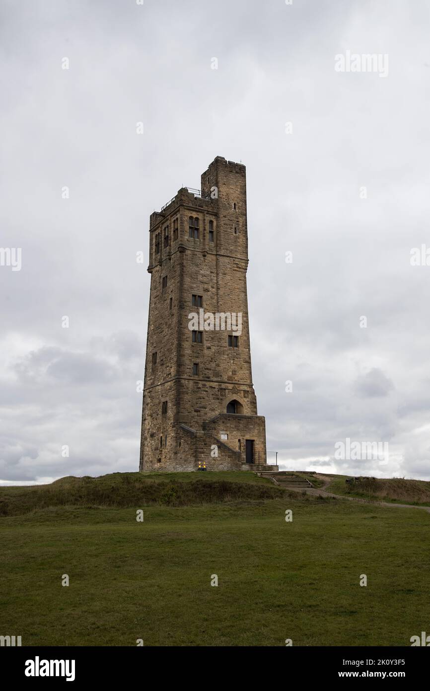 The Victoria Tower, Castle Hill is a scheduled ancient monument in Almondbury overlooking Huddersfield commemorating Queen Victoria's 60 year reign Stock Photo