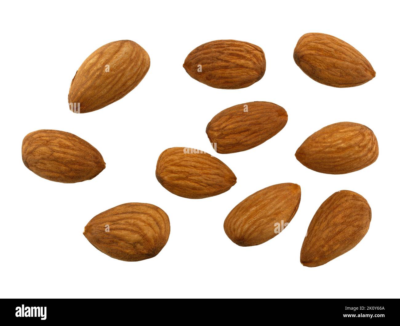 Overhead view of a medium group of almond nuts isolated on a white background. Stock Photo