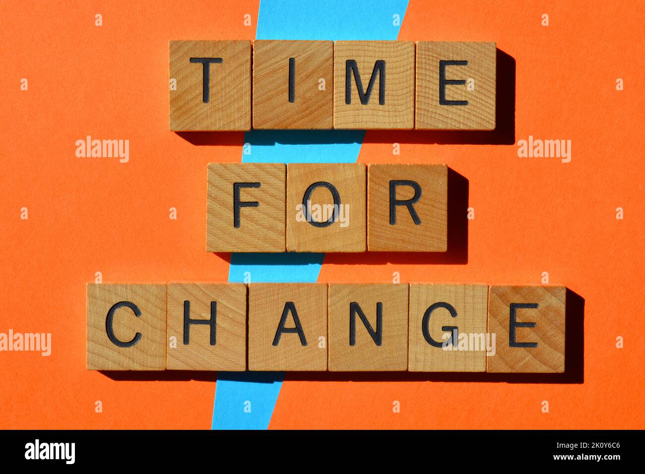 Time For Change, words in wooden alphabet etters isolated on background Stock Photo