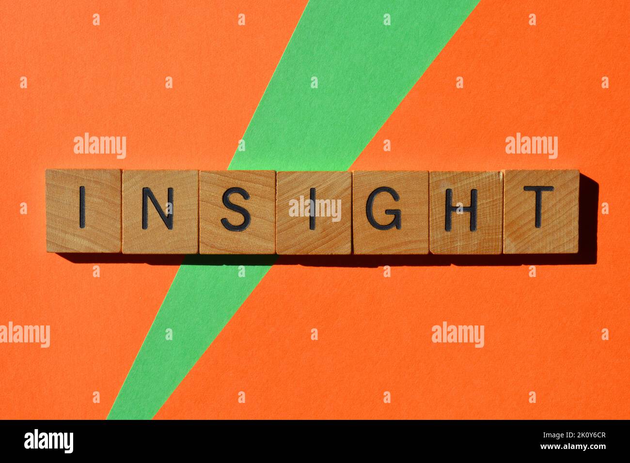 Insight, word in wooden alphabet letters isolated on background Stock Photo