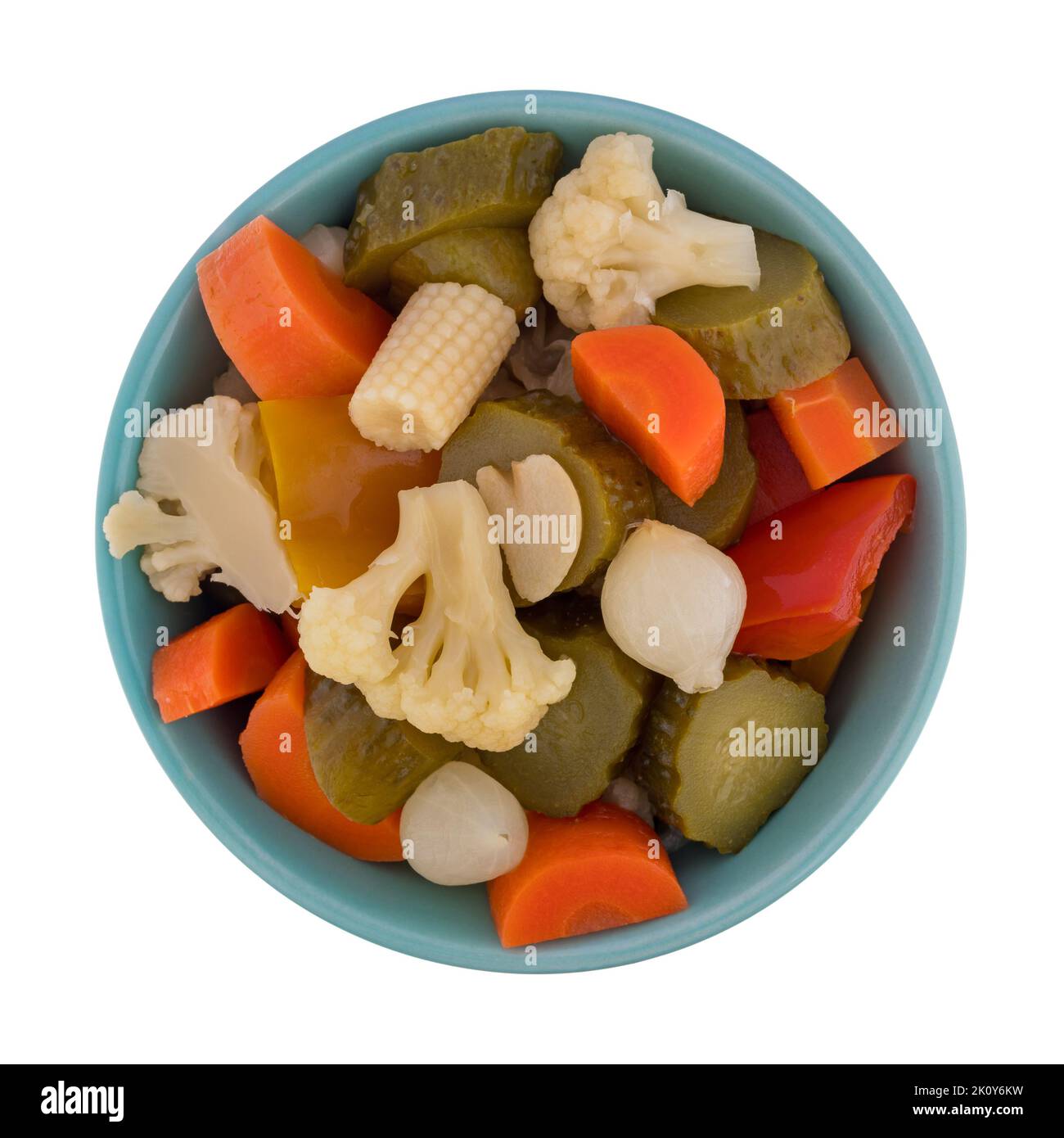 Top view of giardiniera pickled vegetables in a blue bowl isolated on a white background. Stock Photo