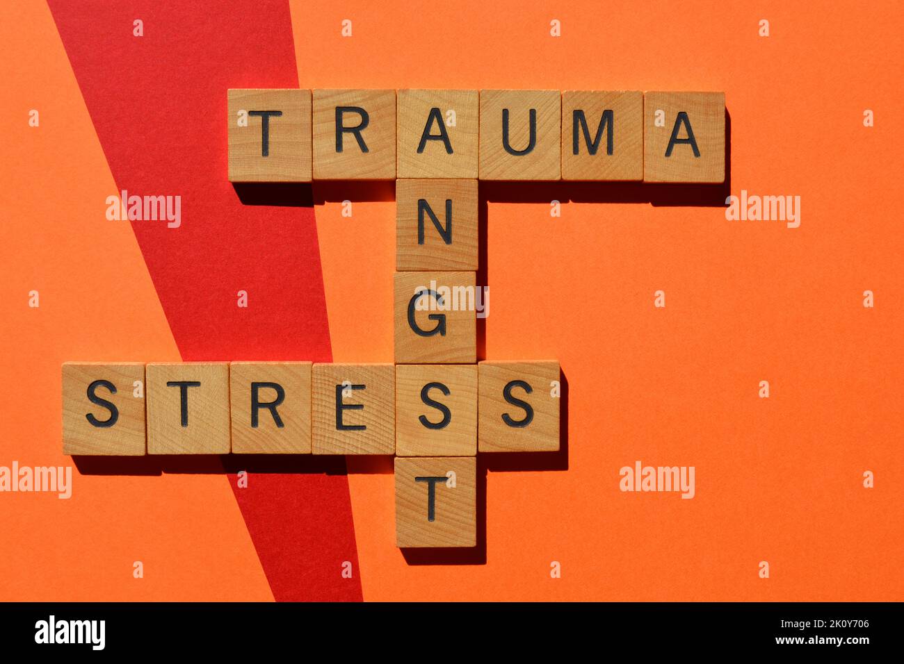 Trauma, Angst, Stress, words in wooden alphabet letters in crossword form isolated on background Stock Photo