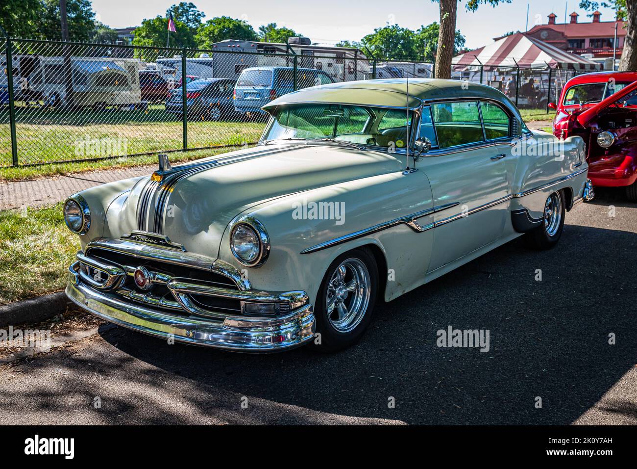 Falcon Heights, MN - June 18, 2022: High perspective front corner view of a 1953 Pontiac Chieftain 2 Door Sedan at a local car show. Stock Photo